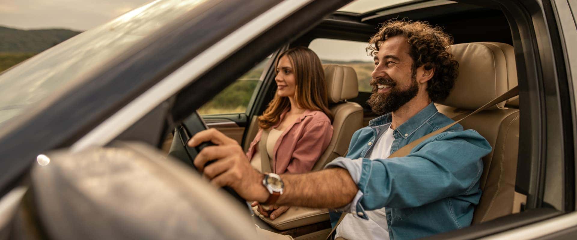 First time buyers driving off in their car