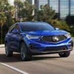 2019 Acura RDX driving blue