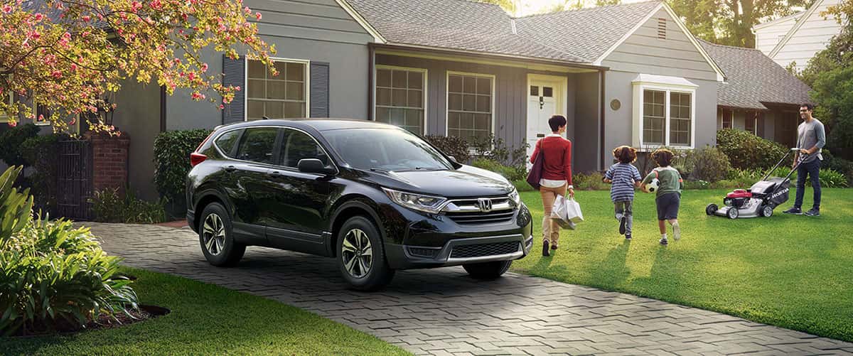 2017 honda cr-v in front of house