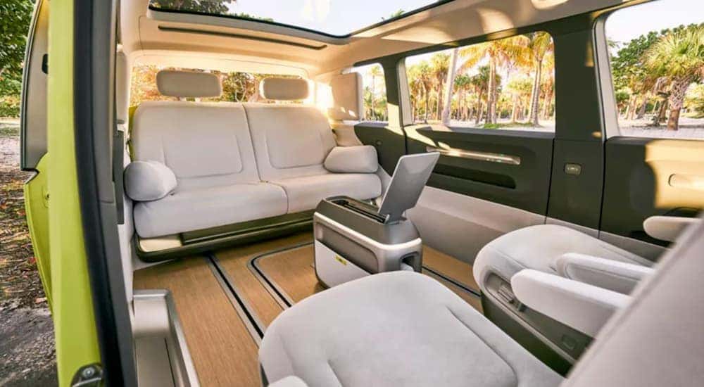 The modern interior of a Volkswagen ID.BUZZ concept van is shown.