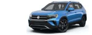 A blue 2022 Volkswagen Taos SEL is angled left.