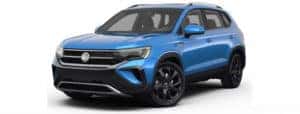 A blue 2022 Volkswagen Taos is shown facing left.