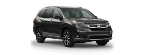 A grey 2022 Honda Pilot is angled right.