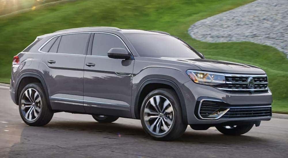 A grey 2023 Volkswagen Atlas Cross Sport SEL is angled right.