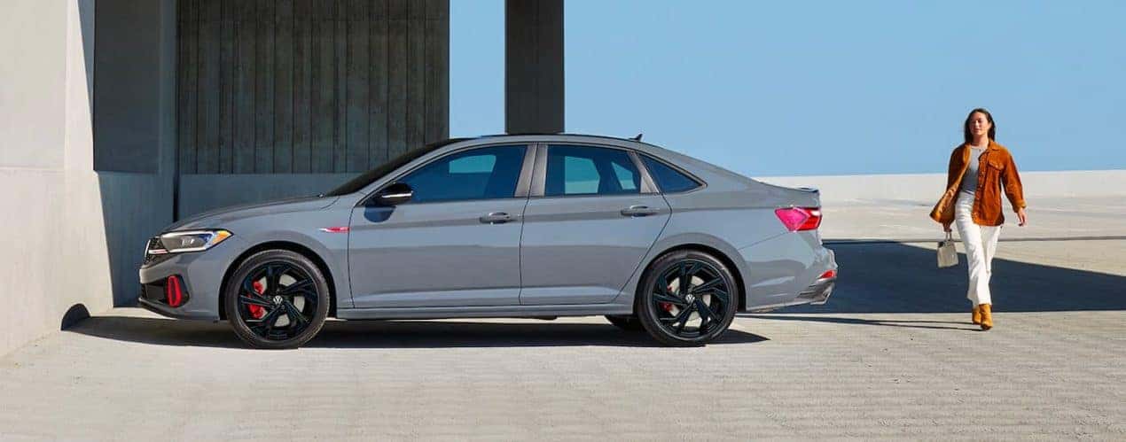 A grey 2023 Volkswagen Jetta GLI Autobahn is shown from the side.