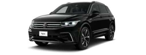 A black 2023 Volkswagen Tiguan SEL R-Line is angled left.