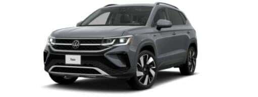A grey 2023 Volkswagen Taos SEL is angled left.