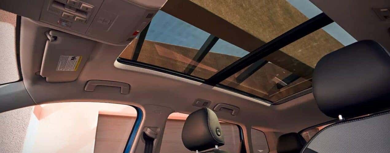 The moonroof in a 2023 Volkswagen Taos is shown during a 2023 Volkswagen Taos vs 2023 Toyota Corolla Cross comparison.