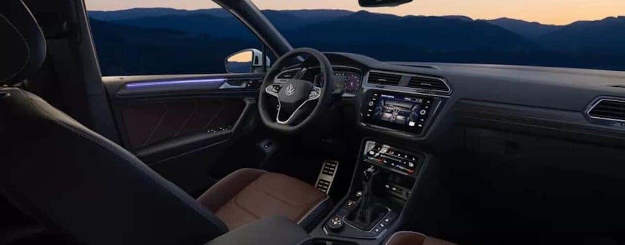 The brown interior of a 2023 Volkswagen Tiguan is shown during a 2023 Volkswagen Tiguan vs 2023 Nissan Rogue comparison.