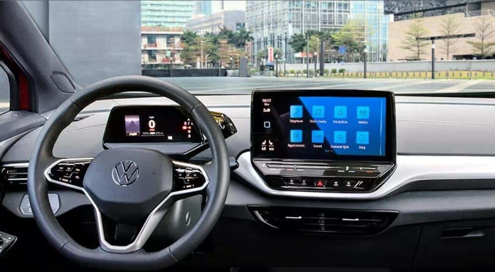 The gray interior and dash of a 2023 Volkswagen ID.4 is shown.