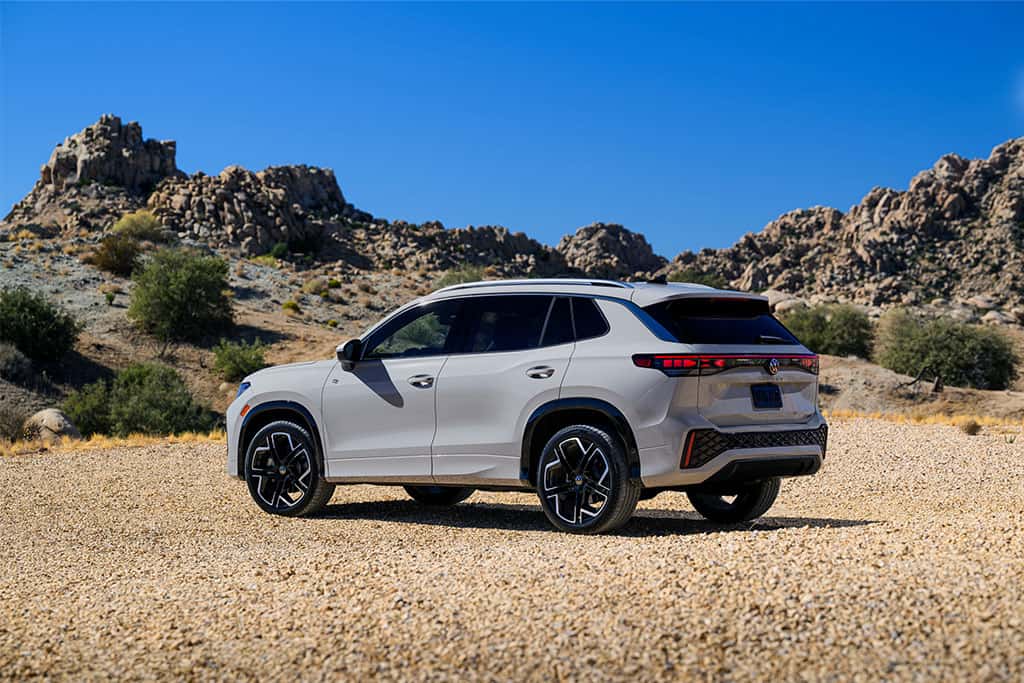 2025 Tiguan SEL R-Line in Sandstone parked showing the rear
