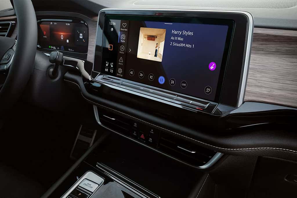 2026 VW Atlas interior showing infotainment with music playing on the multimedia screen