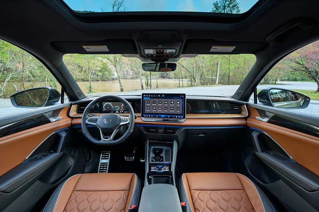 2026 VW Tiguan SEL R-Line Turbo showing interior infotainment technology with leather seats