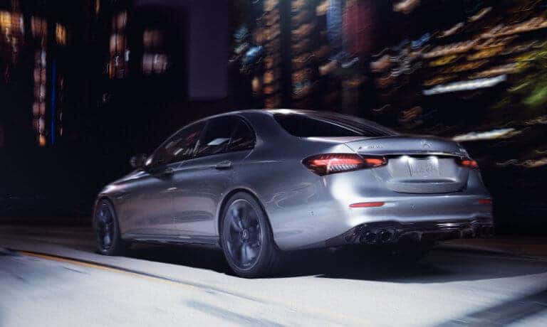 2021 Mercedes-Benz E-Class Sedan exterior city driving away at night