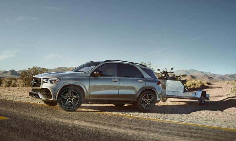 2021 Mercedes-Benz GLE SUV exterior in desert towing trailer