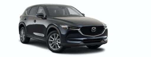 A black 2021 Mazda CX-5 Signature is angled right.