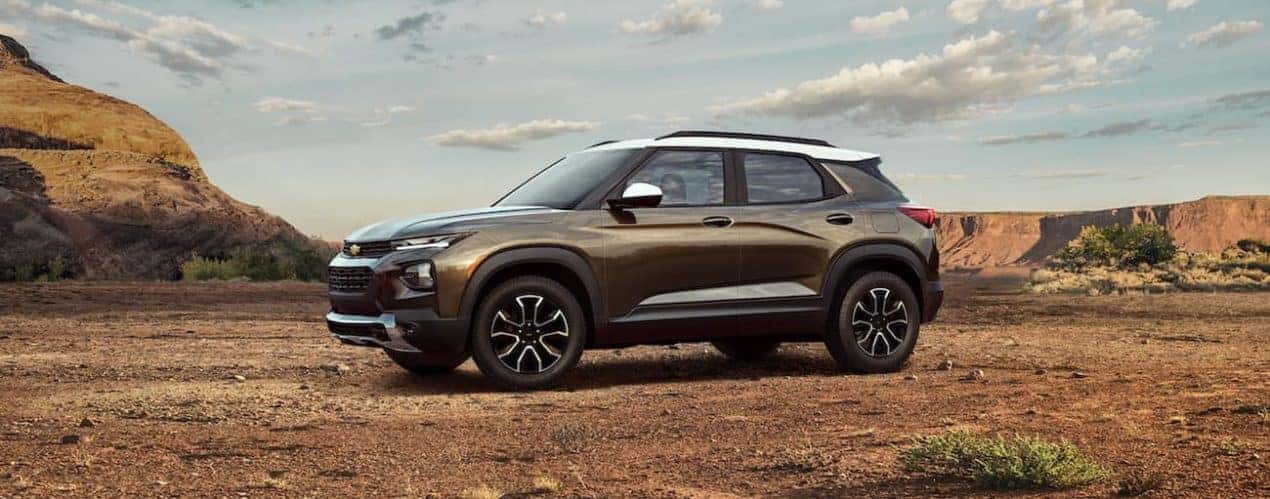 A bronze 2022 Chevy Trailblazer ACTIV is shown parked in a desert.