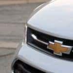 white chevrolet car on road during daytime