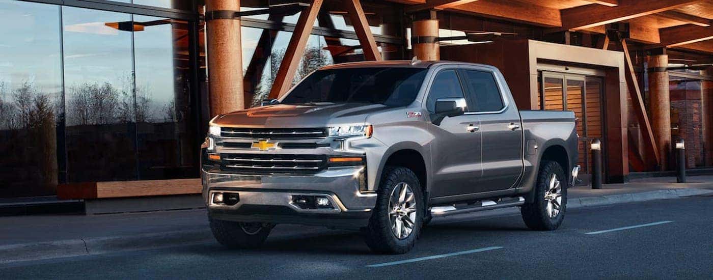 A silver 2021 Chevy Silverado 1500 Z71 is shown from the front at an angle.