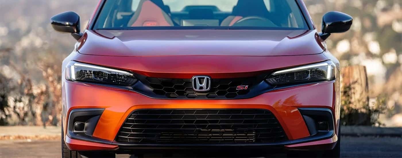 Front of an orange 2023 Honda Civic Si