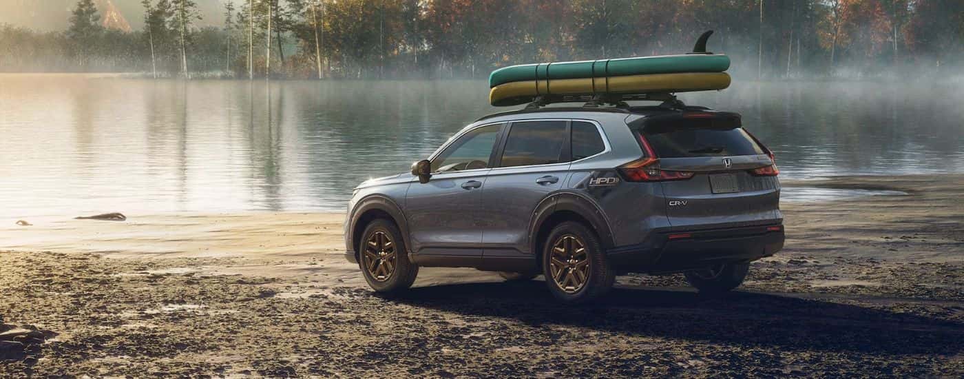 Grey 2026 Honda CR-V HPD edition with paddleboards on top.