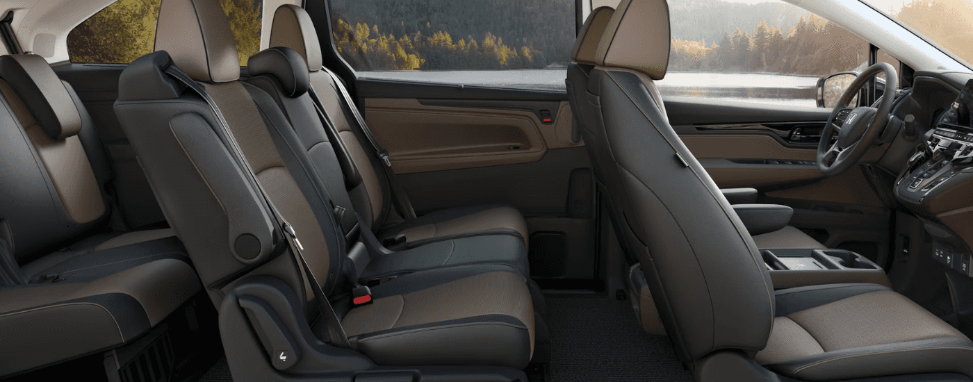 Black and brown leather interior of a 2026 Honda Odyssey