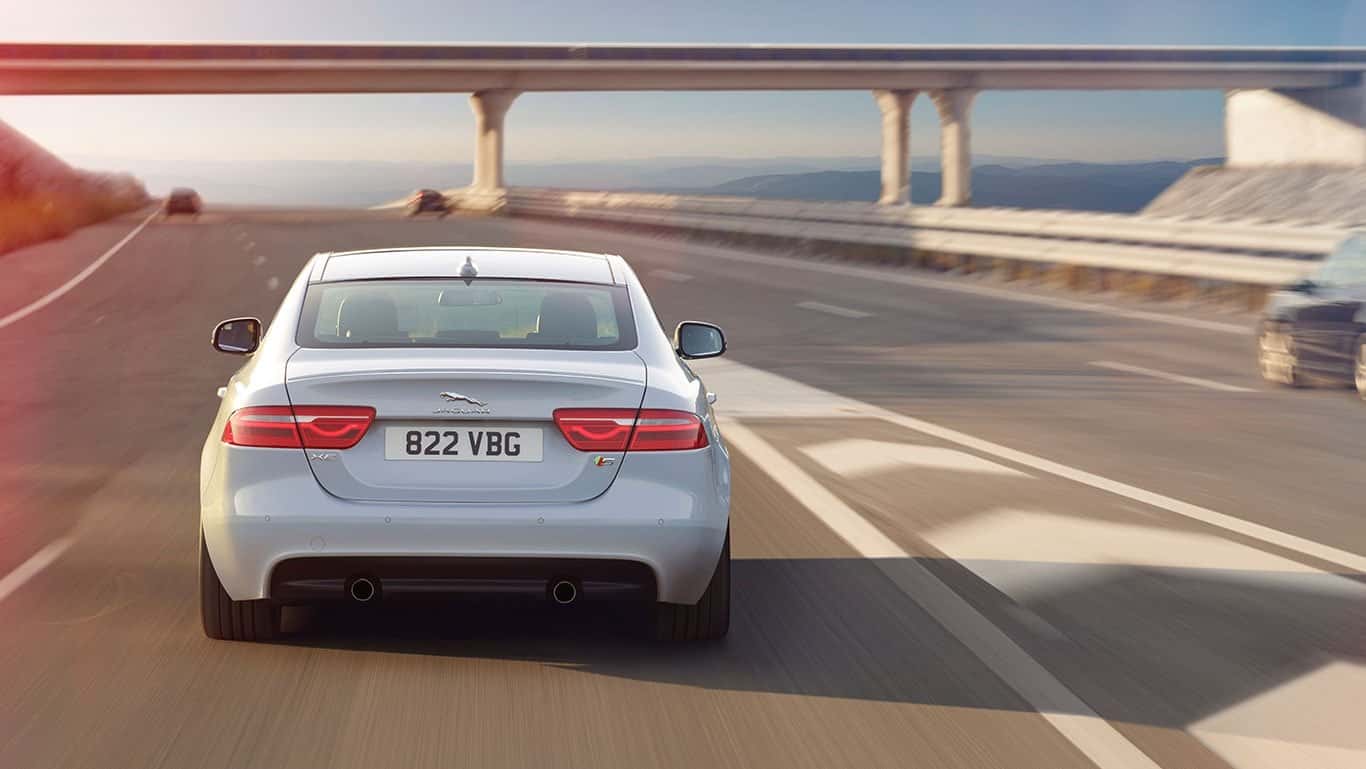2018 Jaguar XE Rear View Driving