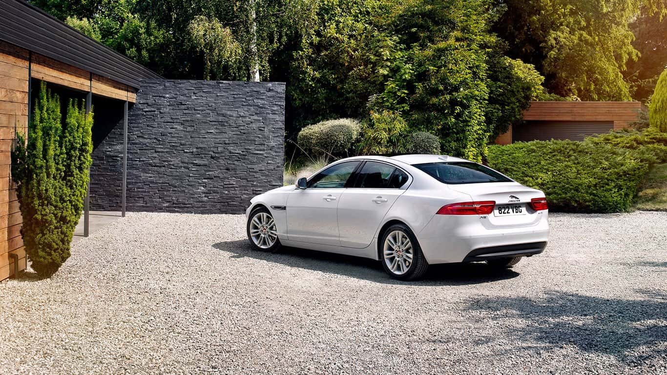 2018 Jaguar XE parked in front of house