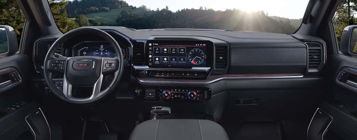 The dashboard of a 2023 GMC Sierra 1500 SLT is shown.