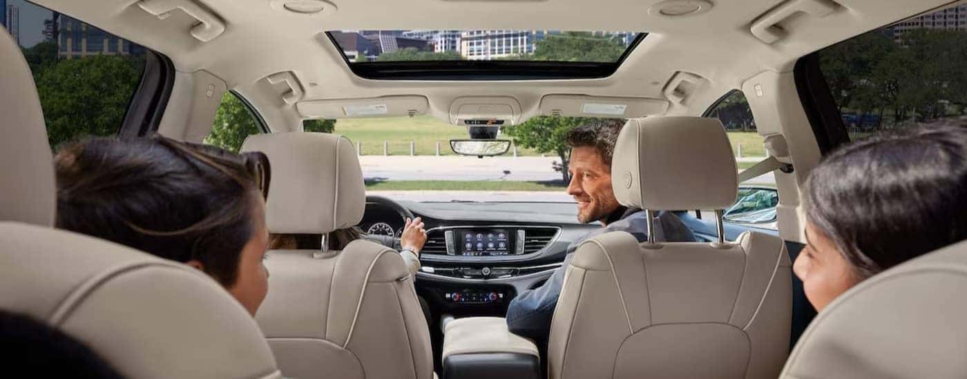 The white interior in a 2024 Buick Enclave is shown.