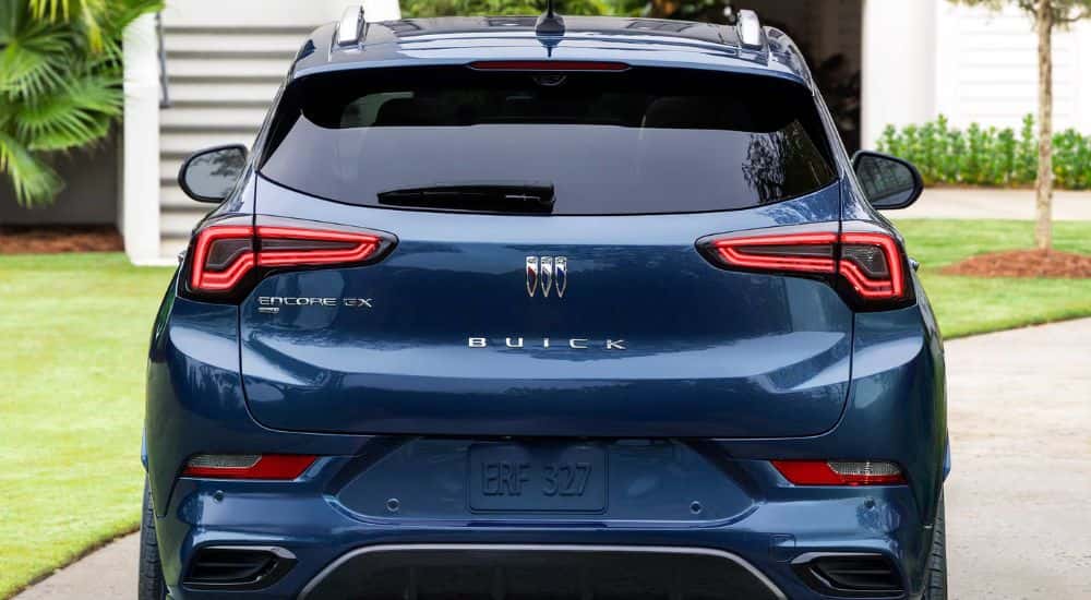The rear end of a blue 2025 Buick Encore GX.