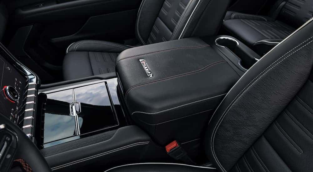 A close-up on the front seats in the interior of a 2025 GMC Yukon AT4.