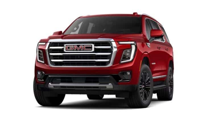 A red 2025 GMC Yukon is angled left.