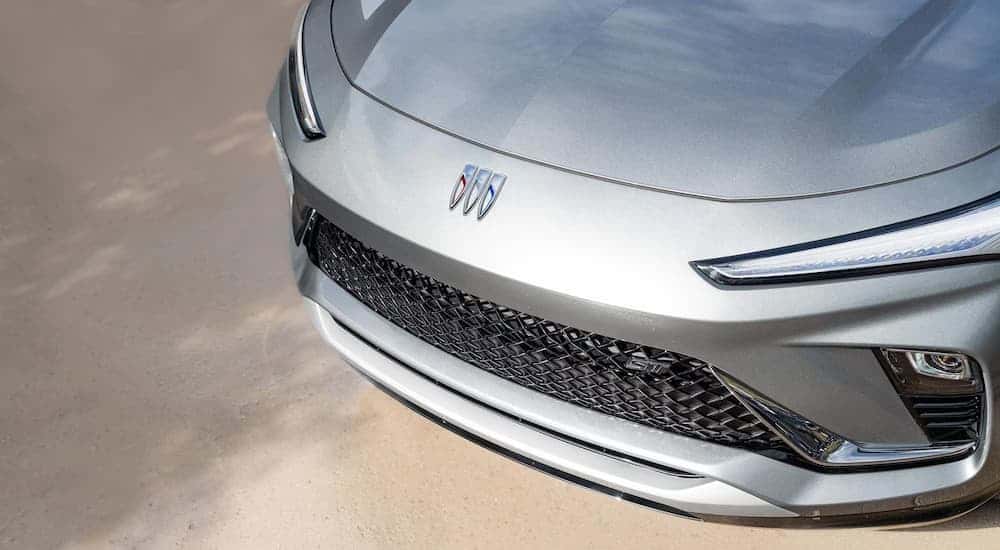 Close-up on the hood of a silver 2025 Buick Envista.