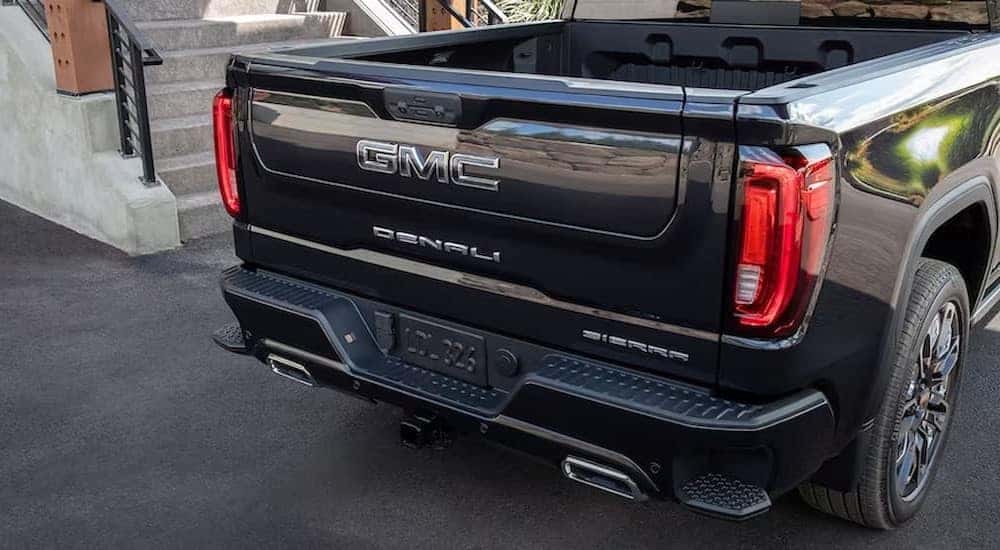 Close-up of the tailgate on a black 2025 GMC Sierra 1500 Denali.