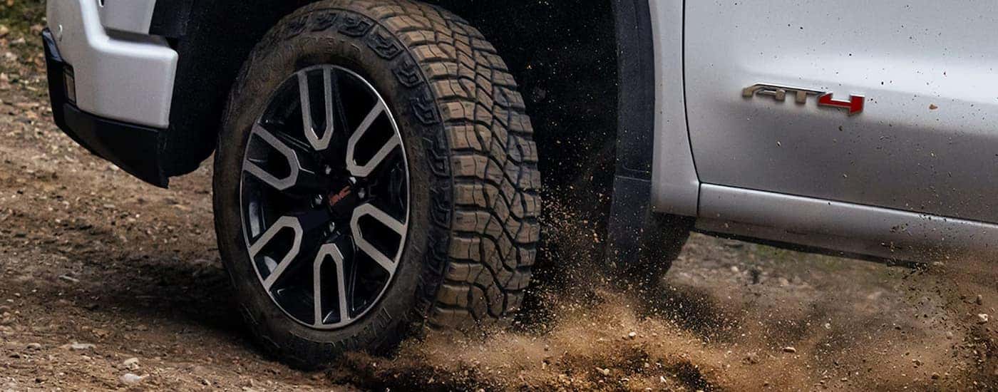 Tire and rim on a 2025 GMC Sierra 1500 AT4 off-roading