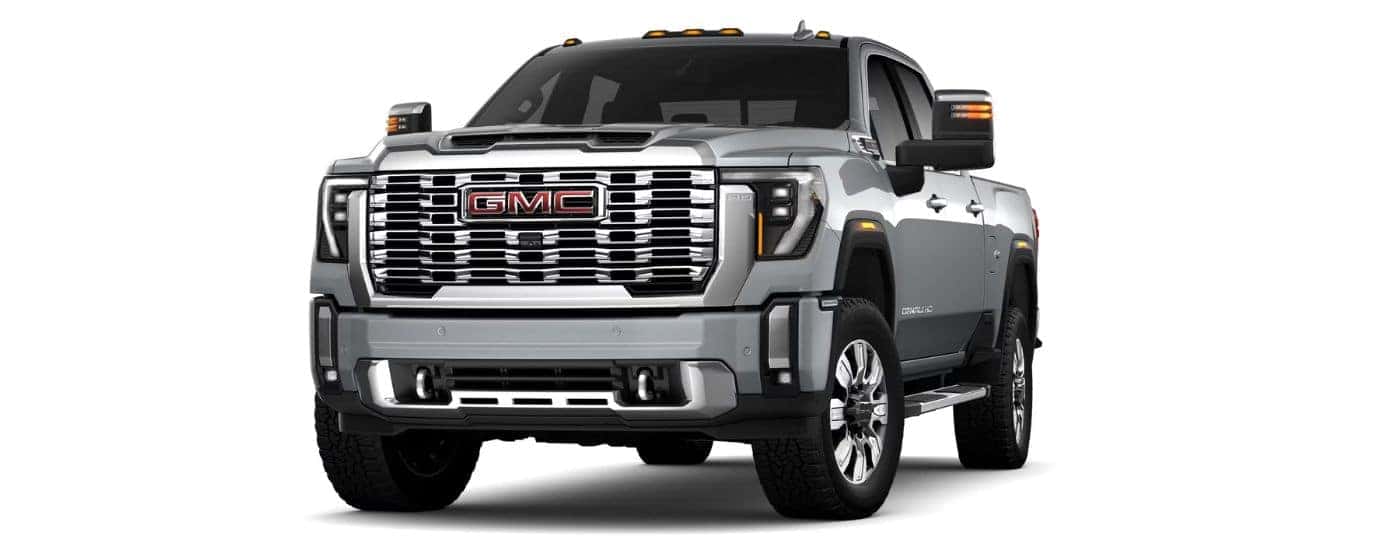 A silver 2024 GMC Sierra 3500 HD Denali angled left.
