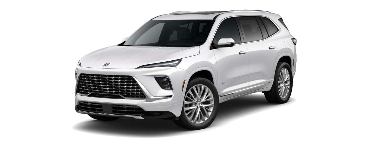 A white 2025 Buick Enclave Avenir angled left.