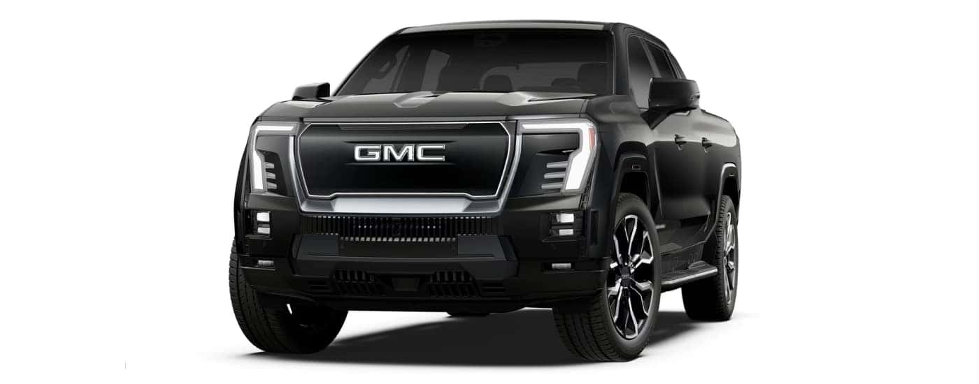 A black 2025 GMC Sierra EV Denali angled left.