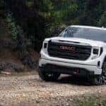 A white 2024 GMC Sierra 1500 AT4 work trucks for sale