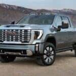 A silver 2025 GMC Sierra 2500 for sale in Buford parked off-road.