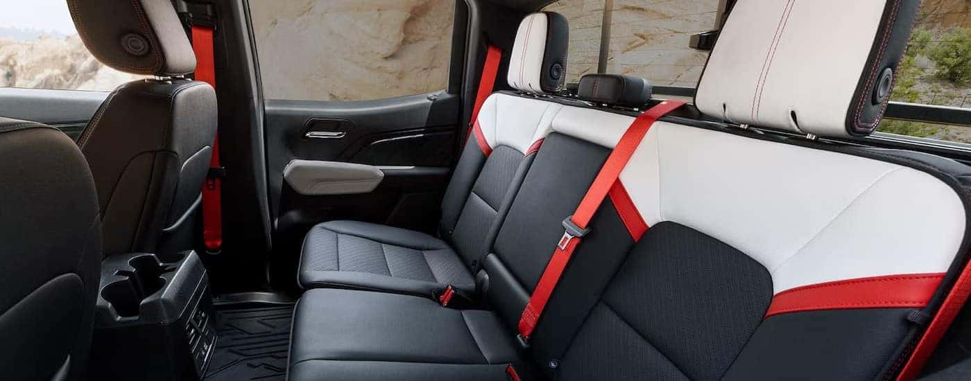 The multi-colored rear seats in a 2025 GMC Canyon.