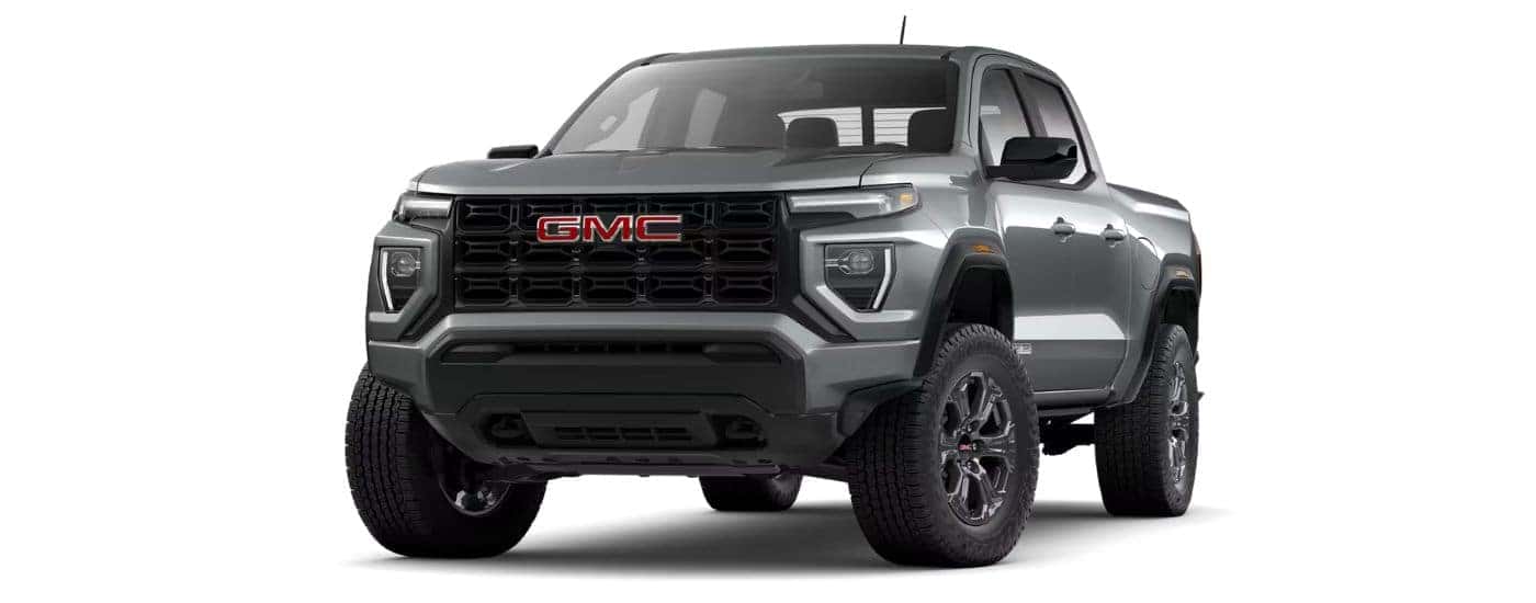 A silver 2025 GMC Canyon angled left.