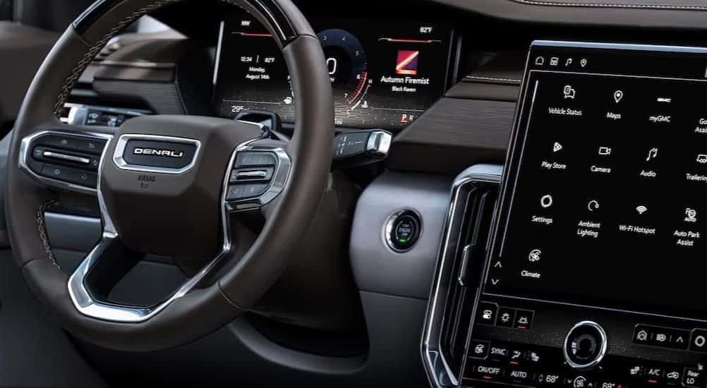 The black dash in a 2026 GMC Acadia Denali for sale.
