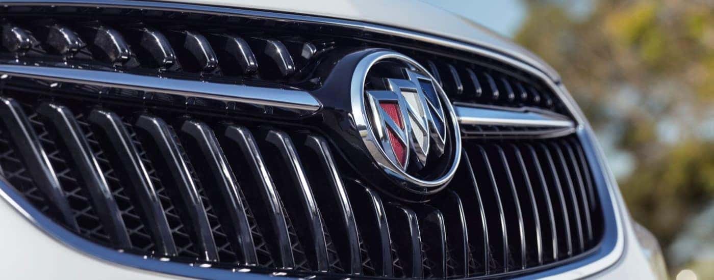 A close up shows the grille on a white 2022 Buick Encore.