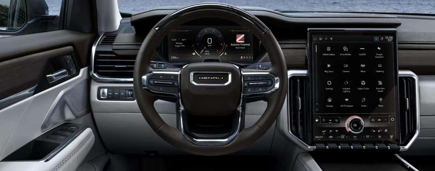 Infotainment and digital gauge cluster on a 2025 GMC Acadia Denali for sale