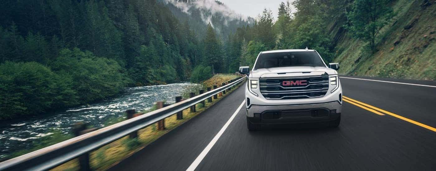 A white 2025 GMC Sierra 1500 for sale near Sandy Springs from the front.