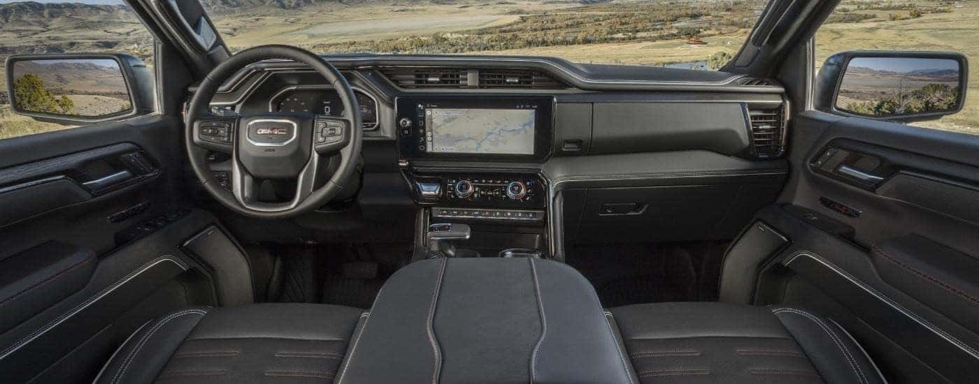 The black interior of a 2025 GMC Sierra 1500 .