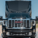 Grille and front badging of a black 2026 GMC Sierra 2500 HD for sale near Sandy Springs