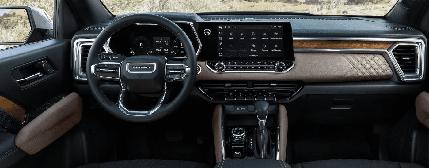 Brown leather interior and infotainment system in a 2026 GMC Canyon
